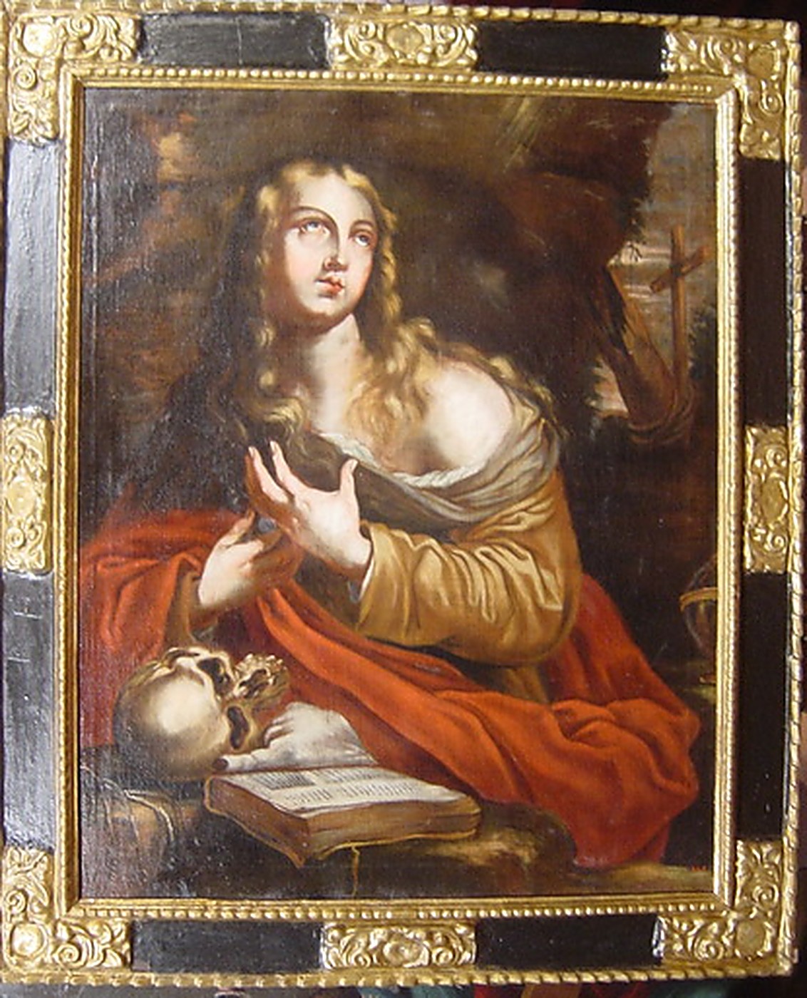 Resultat final: la Magdalena penitent restaurada, amb el marc daurat