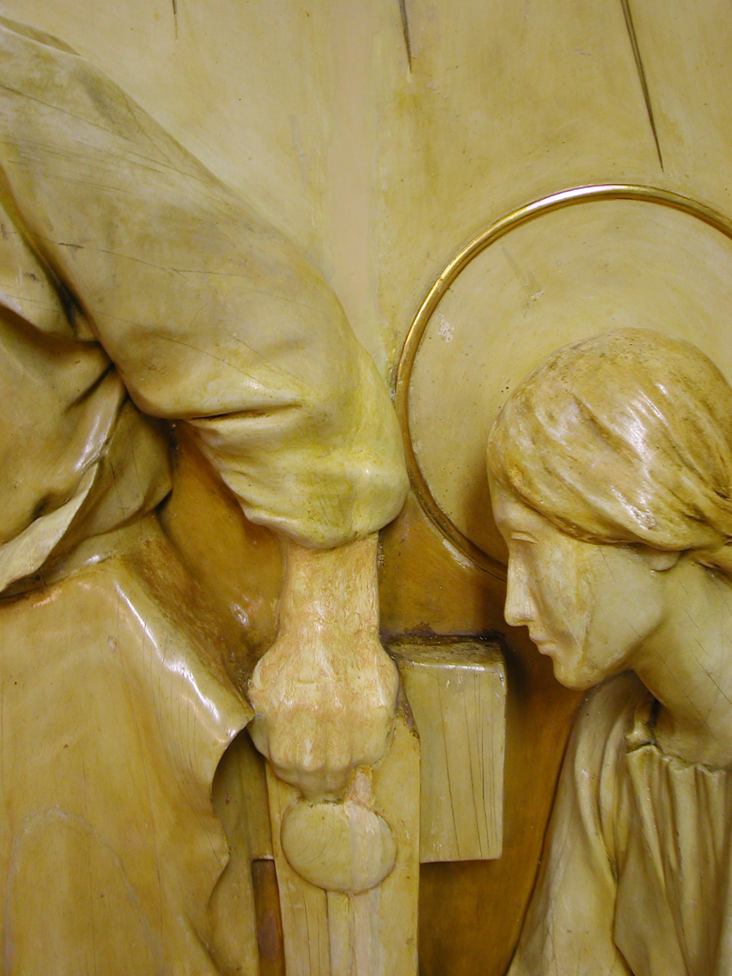 Detall restaurat de la figura infantil